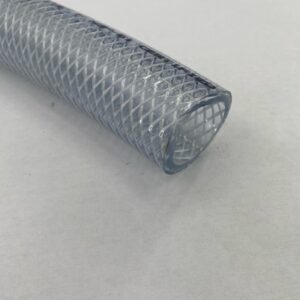 Close-up of cut PVC hose with braided mesh