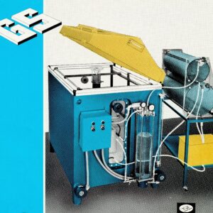 Early GS salt spray corrosion test chamber with external solution reservoirs and pneumatic controls used for ASTM B117 corrosion testing.