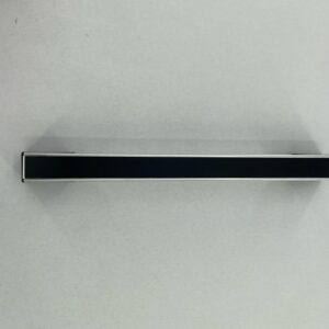A black handle on a white door