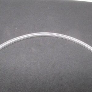 Clear curved flexible tubing on black