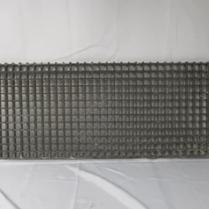 Long rectangular industrial grid resting horizontally