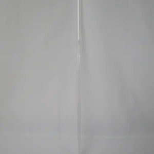 Transparent plastic tube photographed on white background