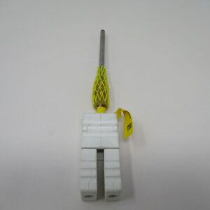 Metal shaft with yellow protective mesh and tag