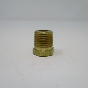 Brass threaded hex bushing on white background