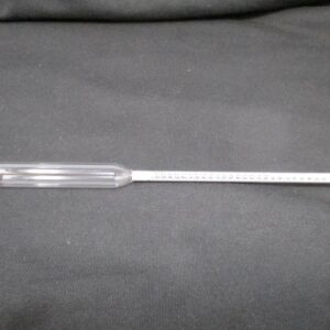 Long hydrometer laid flat on black cloth