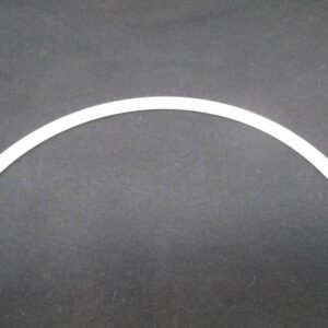 Curved white nylon strip sample