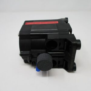 Side view small black pump module with label