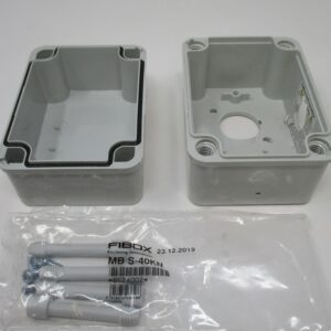 two gray junction box halves with fittings