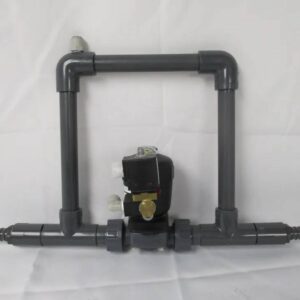 PVC manifold with black solenoid valve