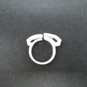 White plastic snap hose clamp