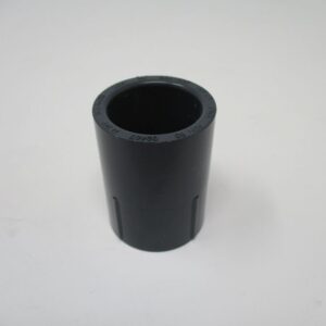 Short black cylindrical plastic sleeve