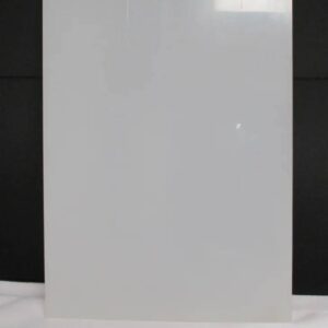 Opaque white plastic sheet on black backdrop