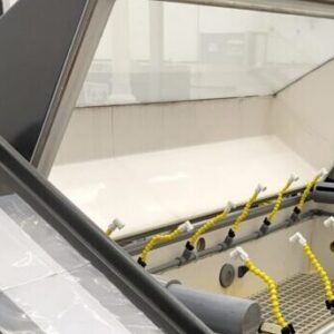 Auto Technology CCT-NC cyclic corrosion chamber interior showing multiple spray heads and horizontal dispersion towers for uniform salt fog distribution.