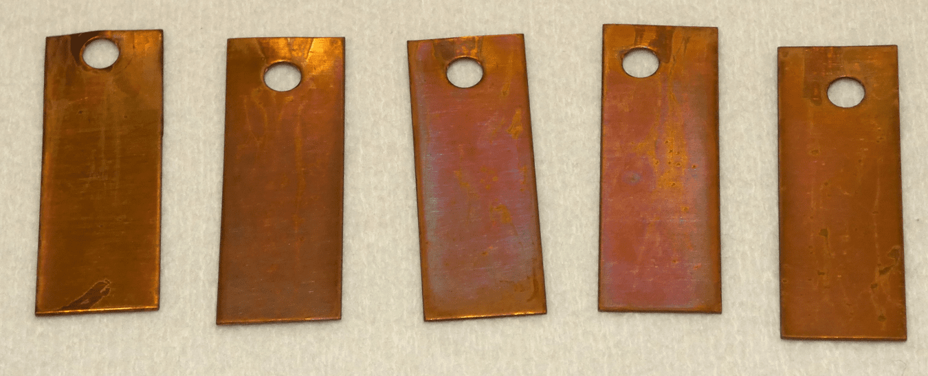 High-purity copper mass gain coupons used to monitor environmental corrosivity within an MFG reaction chamber.