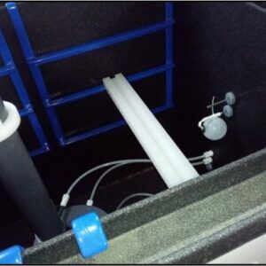 6 degree slotted polypropylene panel support bars installed in corrosion chamber rack for aerospace and NADCAP corrosion testing programs