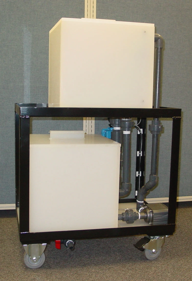 Full left-side view of the immersion chamber cart showing the lower water supply tank and vertical plumbing pipes.